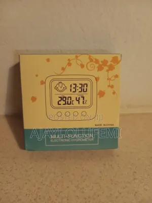 LCD Thermometer / Hygrometer With Clock.