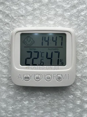 LCD Thermometer / Hygrometer With Clock.