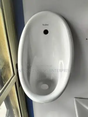 Wall-Mounted Urinal With Manual Flush – 610mm Height