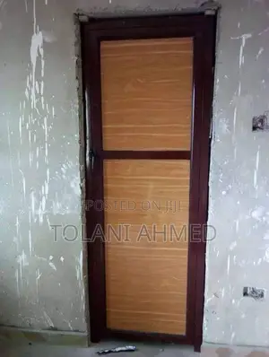 Cofee Brown and Board Bathroom Door