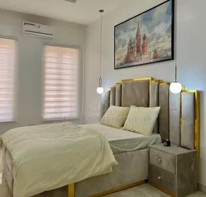 6x6 Padded Bed Frame With a Single Bedside Drawer.
