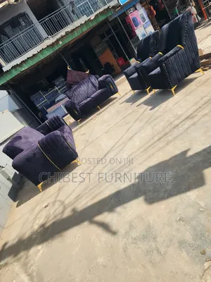 Well Designed Padded 7 Seaters Sofa With Gold Stripes.
