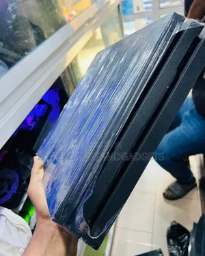 London Used Ps 4 Pro 1tb With 2 Pads and 12 Games