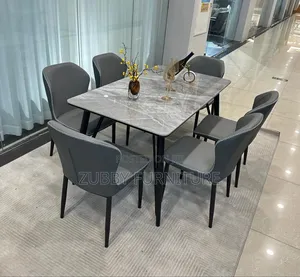Quality and Imported Marble Top Dining Table by 6 Chairs