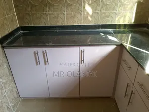 Kitchen Cabinet With Black Marble Top