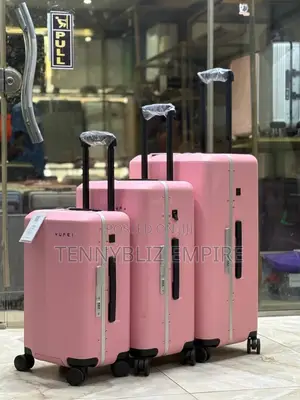 Jetsetter Elegance: The Sleek Black/Pink/Blue Travel Trio