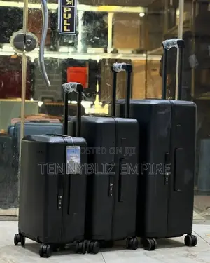 Jetsetter Elegance: The Sleek Black/Pink/Blue Travel Trio