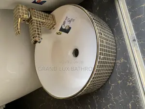 Ceramic Basin With Gold Mosaic Design and Matching Faucet"