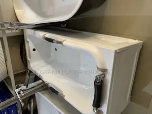 Compact White Bathtub With Side Grips – Ergonomic Design