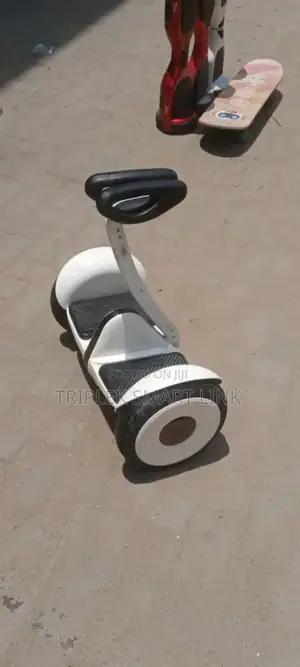 A Mini Segway Hoverboard With a Handle.