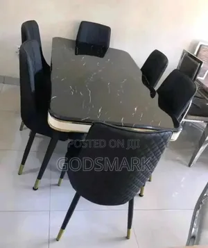 6 Seater Black Dining Set With Marble Top.