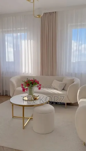 Round Coffee Table With X-Shaped Base