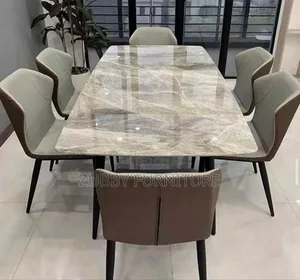 Quality and Imported Marble Top Dining Table by 6 Chairs