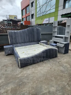 Quality Padded 6by6 Bed Frame With Its Accessories.