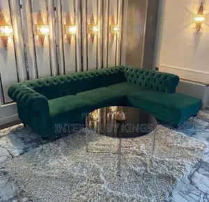 L-Shaped Fabric Sofa With a Center Glass Top Table