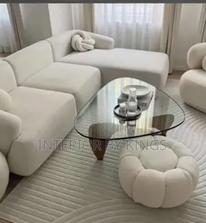L-Shaped Sofa + Single +Glass Top Table an Ottoman