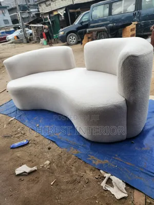 Curved Upholstery Padded Sofa