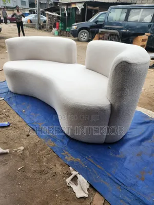 Upholstery Padded Curved Sofa Chair.
