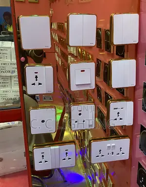 Uk Switches and Socket White and Gold Body