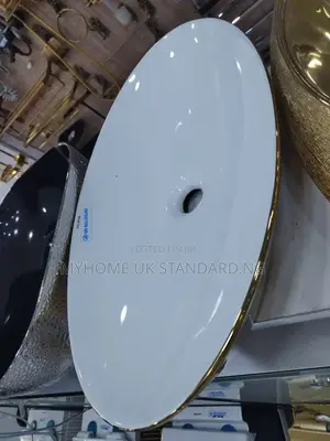 Gold and White Counter Top Wash Hand Basin