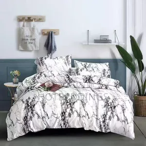 Esquisite Duvet, Bedsheet and 4 Pillow Cases