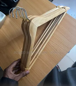 Neat Sets Of Wooden Clothes Hangers