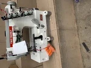 Two Tigerly Taping Machine