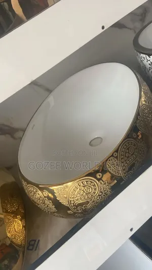 Gold and White Counter Basin