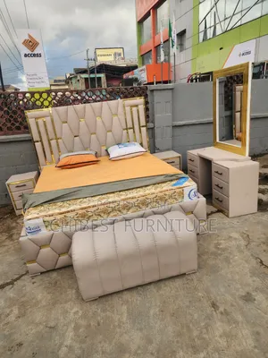 6by6 Cream Leather Bed With Dresser, Cupboards and Footrest
