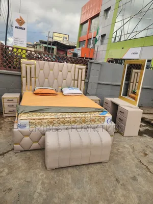 Leathwe 6by6 Bed With Cupboards, Footrest and Dresser.
