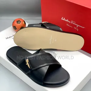 Black Leather Ferragamo Slippers