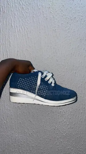 Sneakers/Wedge Sneaker