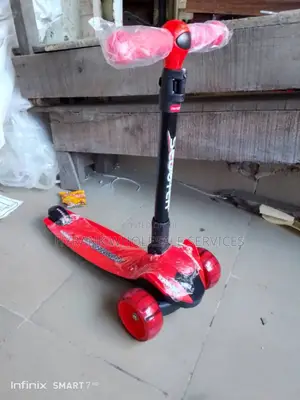 Children Scooter. With Light in the Tires and Music