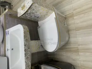 **Luxurious Gold Floral Ceramic Toilet and Sink Set**