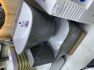 Grey Marble-Effect Toilet and Sink Set With Yellow Accent