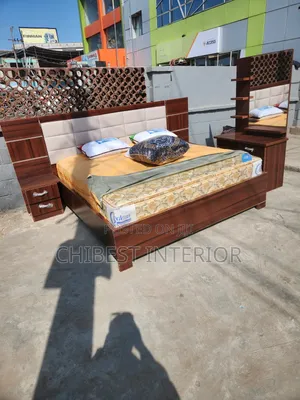 6by6 Wooden Bed With Leather Padding on the Headboard