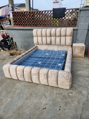 Cream Coloured 4.5by6 Upholstery Bed With Cupboard