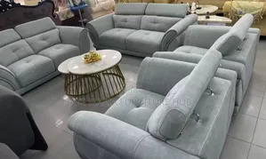 Contemporary Sofa Chair With Adjustable Head Rest.