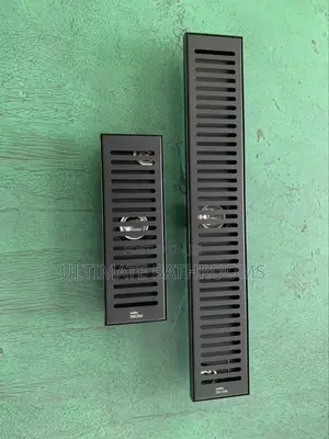 Matte Black Bathroom Floor Drain Line Design