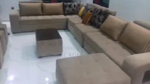 Beautiful U Shape Sofa With Puffs