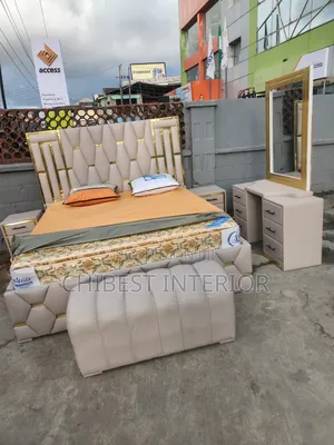 6by6 Cream Leather Bed With Cupboards, Dresser and Footrest