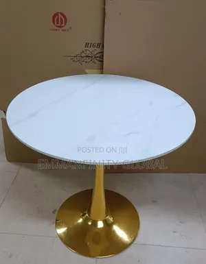Round Marble Dining Table With Gold Base.