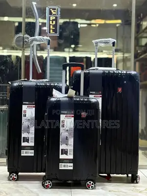 Set of Three Rubber Luggage Boxes