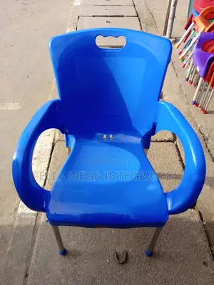 Plastic O K Chair With Ion Leg and Arm Rest.