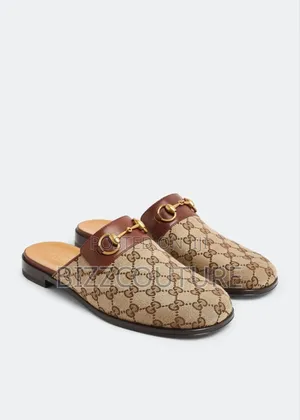 Original Gucci Men's Horsebit Mules Available in Store