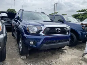 Toyota Tacoma V6 4dr Access Cab 4WD 6.1 ft. SB (4.0L 6cyl 5A) 2015 Blue