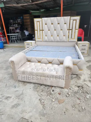 Upholstery Padded Cream Coloured King Size Bed.
