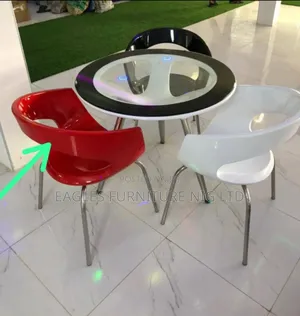 Unique Set of Tampered Glass Table and 3 Chairs