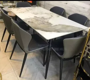 Set of Marble Top Dining Table and Six Leather Chairs.