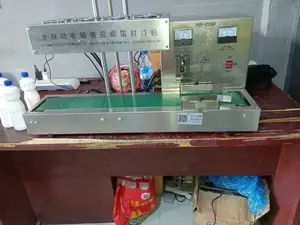 Automatic Induction Foil Sealing. Induction Foil Sealing Machine